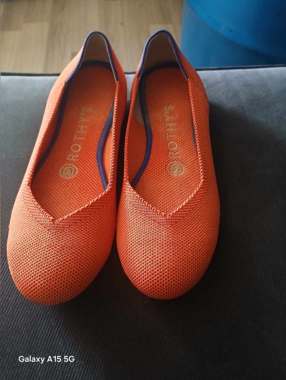 Rothy's Bright Orange Knit Slip-On Flats with Blue Trim